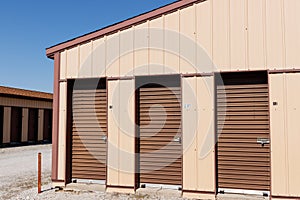 Brown numbered self storage and mini storage garage units II