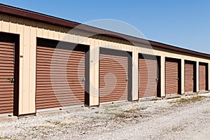 Brown numbered self storage and mini storage garage units III