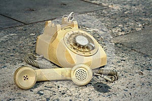 Brown old phone vintage style on a floor.