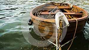 Brown old wooden rowboat