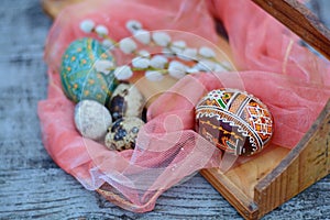 Brown and orange easter egg with traditional ormanent