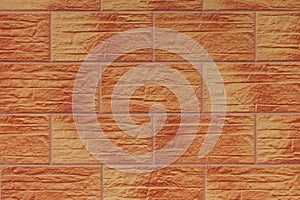Brown-orange paint large brick blocks masonry wall texture background abstract pattern backdrop