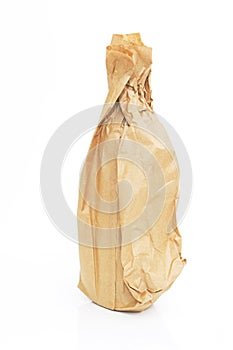 Brown paper bag with a bottle