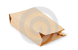 Brown paper bag isolated on white background photo