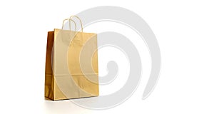 Brown paper bag texture. Kraft recycle package with empty blank space for design mockup isolated on white background