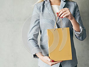 Brown paper bag woman hands presents shopping