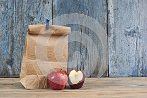 brown paper bag on wooden background