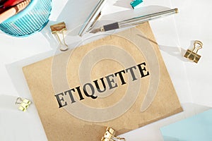 Brown Paper Bag With the Word Etiquette