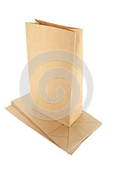 Brown paper bags isolated on white background