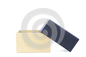 Brown paper box with black lid is open isolated on white background with clipping path