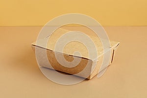 Brown paper food box. Ground color background