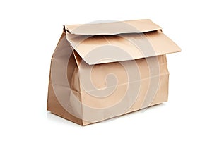 Brown paper lunch sack isolated on white background