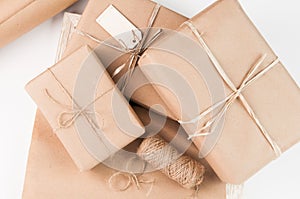 Brown paper packages wrapped up with string