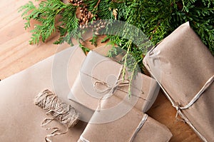 Brown paper packages wrapped up with string