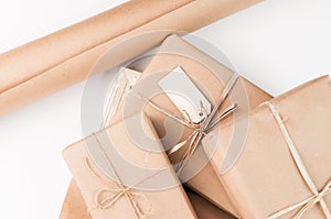 Brown paper packages wrapped up with string