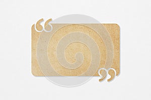 brown paper quote background with quotation marks on grunge white paper including clipping path, useful for customer