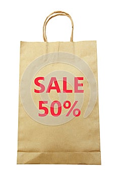 Brown paper shopping bag with Sale 50 % text isolated on white background (clipping path)