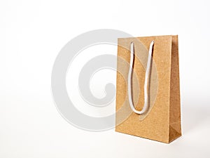 brown paper shopping bag on white background