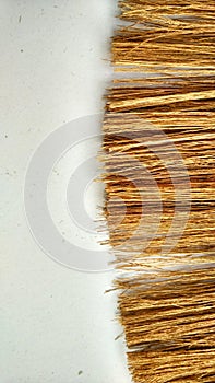 Brown pattern of injuk broom strands from rice stalks to clean dust