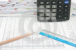 Brown pencil and ruler with calculator