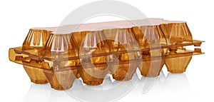 Brown plastic box for eggs isolated on white.