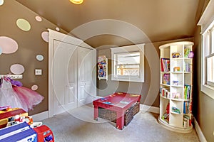 Brown play room kids girl interior with toys.