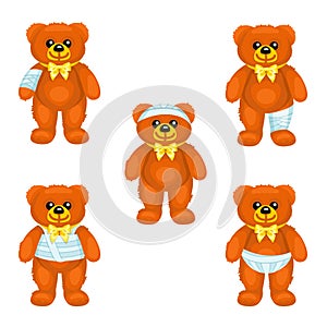 Brown plush bear with bandages around the different parts of its body photo