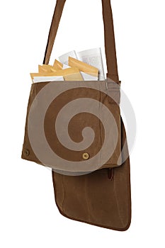 Brown postman bag with mails and newspapers on white background