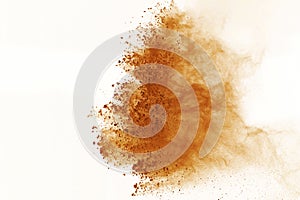 Brown powder explosion isolated on white background. Colored cloud or dust splatted.