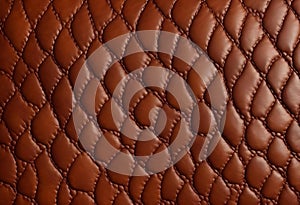 Brown quilted leather texture with diamond pattern