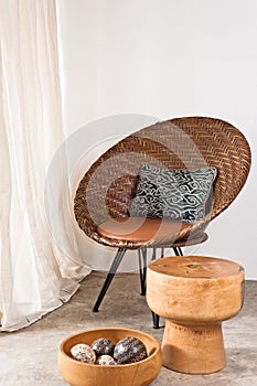 Brown rattan Chair in interior setting photo