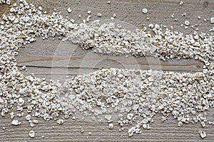 Brown raw cereals in form of spoon