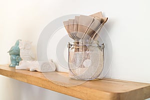 Brown Recycled Bar Napkin in glass jar on wooden shelf