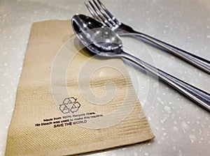 Brown Recycled Material Napkin on a Dinning Table