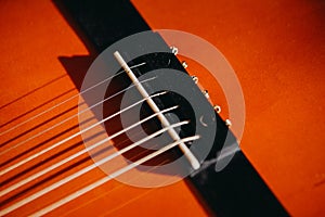 brown red acoustic guitar close up macro