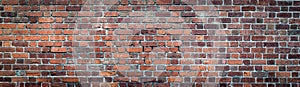 Brown and Red brick wall. Texture of old weathered brick wall panoramic backgorund