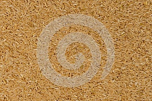 Brown rice background, raw rice for proper nutrition