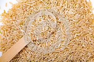 Brown Rice from Close Above with Wood Spoon