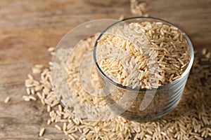 Brown rice in glass on table