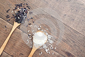 Brown rice or Riceberry and Jasmine rice on wooden spoon