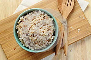 Brown Rice on Wooden Plate