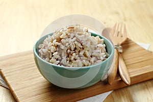 Brown Rice on Wooden Plate