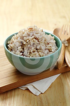 Brown Rice on Wooden Plate