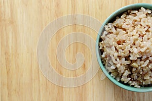 Brown Rice on Wooden Table