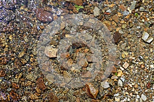 Brown river stone bottom background texture