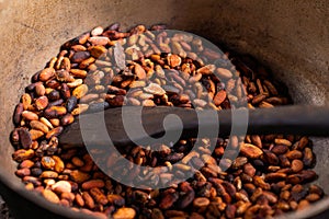 Brown roasted cocoa beans. Background, the process of making cocoa