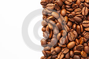 Brown roasted coffee beans seed on white background