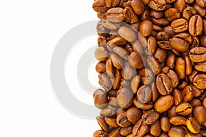 Brown roasted coffee beans seed on white background