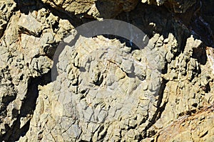 Brown rocks, Elba mountain, water, natural abstract background