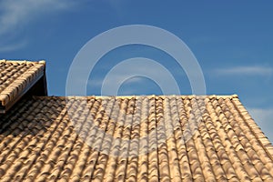 Brown Roof Tiling with Blue Sky Background